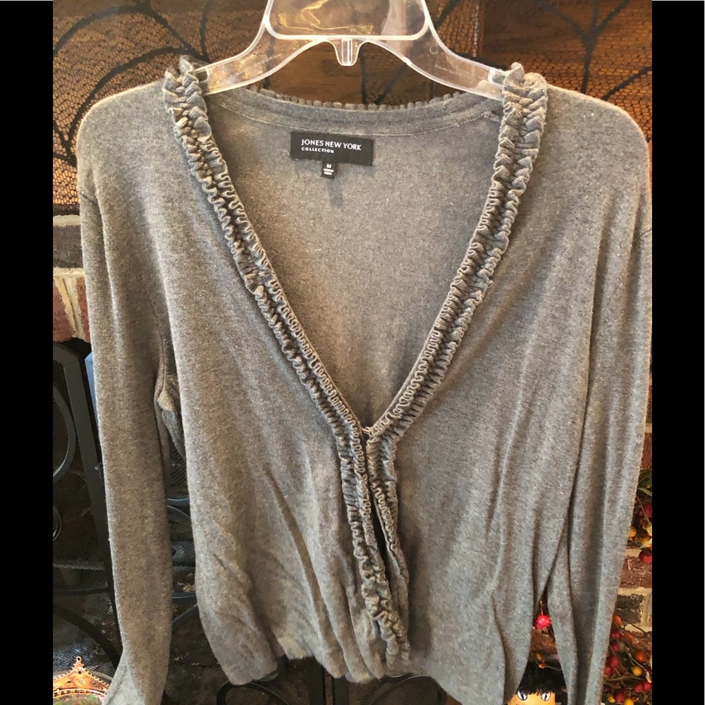Beautiful ruffled trim gray cardigan.
